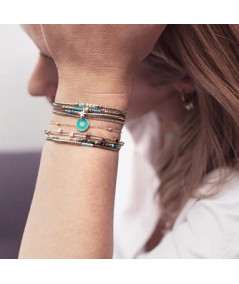 bracelet multi rangs avec pierres natureles et motifs acier