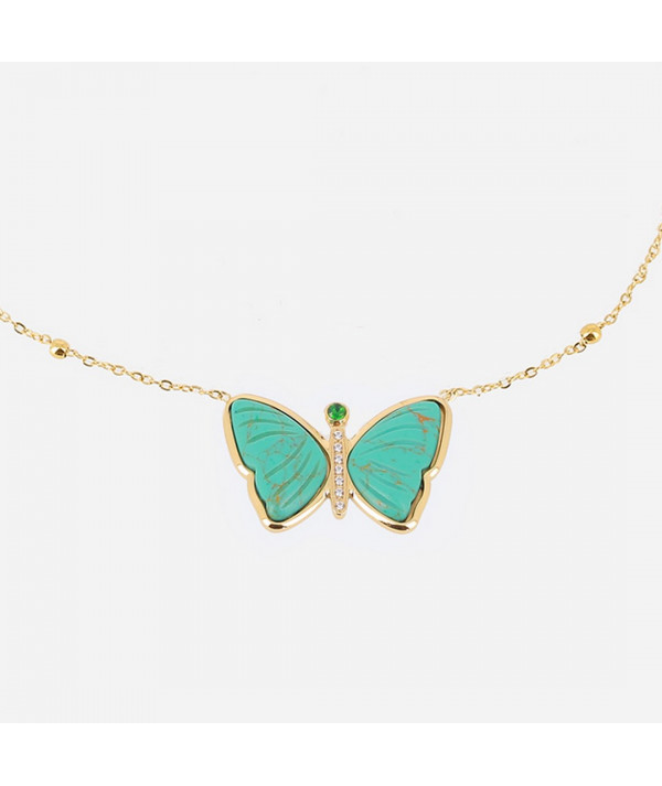 collier papillon turquoise en acier doré  joly-pottuz megève