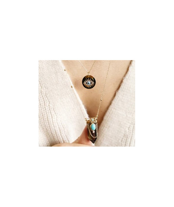 Pendentif bon oeil en acier doré vendu par Joly-pottuz Megéve