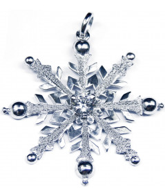 Pendentif flocon de neige , cristal en argent 925 et Zirconium par JOLY-POTTUZ joaillier Megève