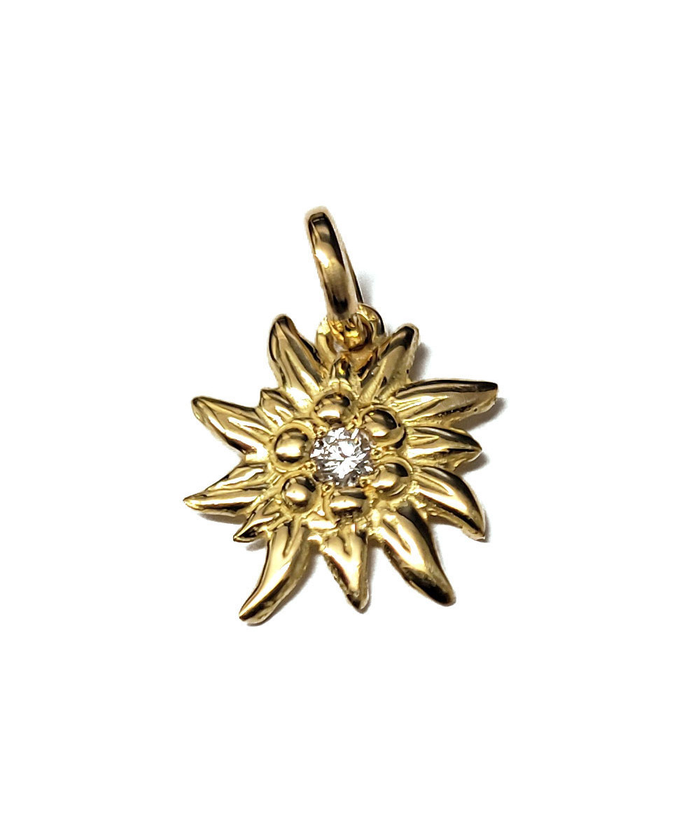 Pendentif serti d'un étincelant Diamant  serti au coeur de l'édelweiss