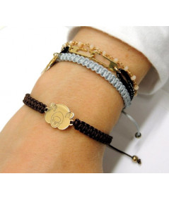 Bracelet tressé avec motif marmotte en or jaune