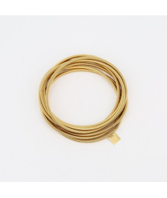 bracelet ressort en acier doré semainier 7