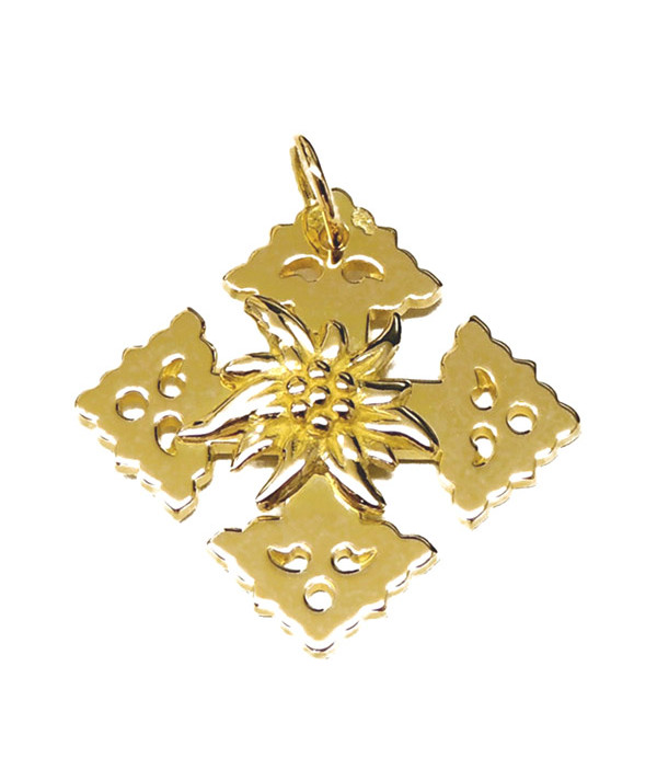 Croix de Mgève en or  avec une edelweiss  en relièf //Joly-Pottuz Megève//