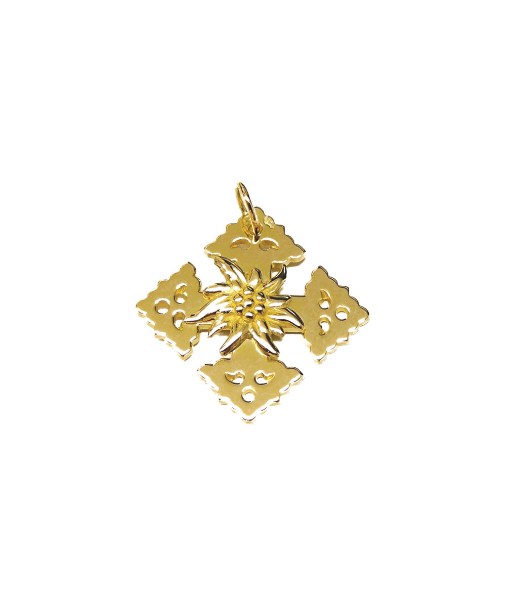 Croix de Mgève en or  avec une edelweiss  en relièf //Joly-Pottuz Megève//