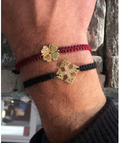 Bracelet cordon tressé avec motif trèfle en or 750/000  création Joly-Pottuz// Megève//