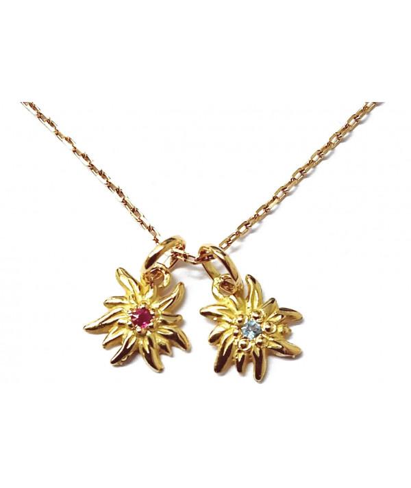 Edelweiss  en jaune avec rubis et topaze bleue traitée