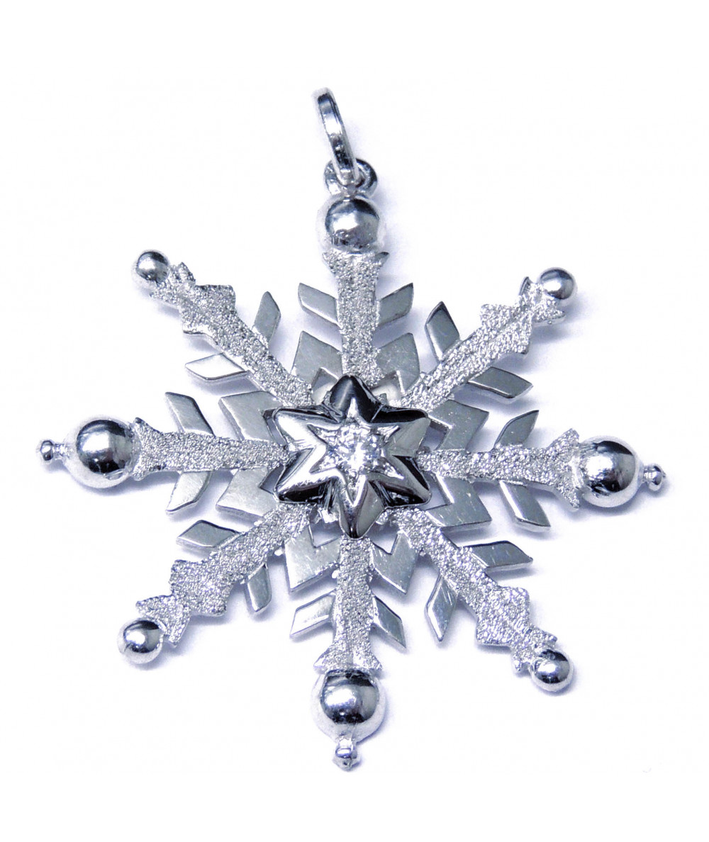 Pendentif flocon de neige , cristal en argent 925 et Zirconium par JOLY-POTTUZ joaillier Megève