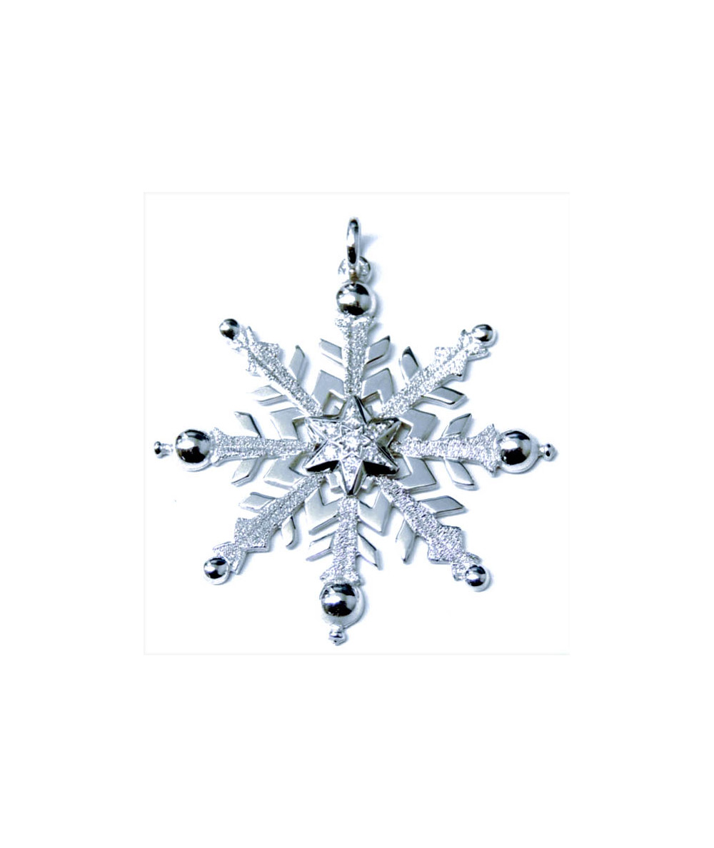 Pendentif cristal de neige or 750 et Diamant par JOLY-POTTUZ  joaillier Megève