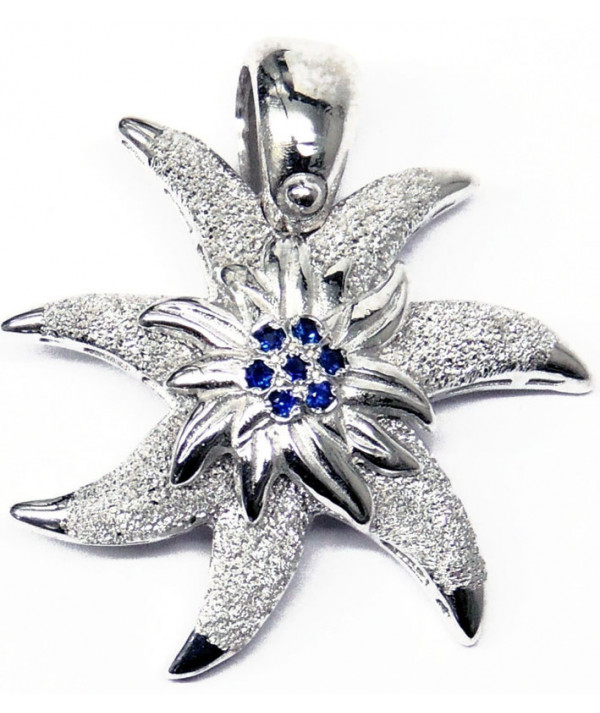 Pendentif edelweiss en argent925/000 son coeur est serti de saphirs fins Joly-Pottuz//megève//