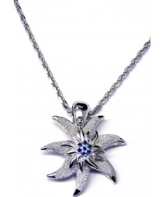 Pendentif edelweiss en argent925/000 son coeur est serti de saphirs fins Joly-Pottuz//megève//