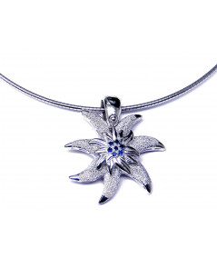 Pendentif Edelweiss en argent925/000 son coeur est serti de saphirs fins Joly-Pottuz//megève//